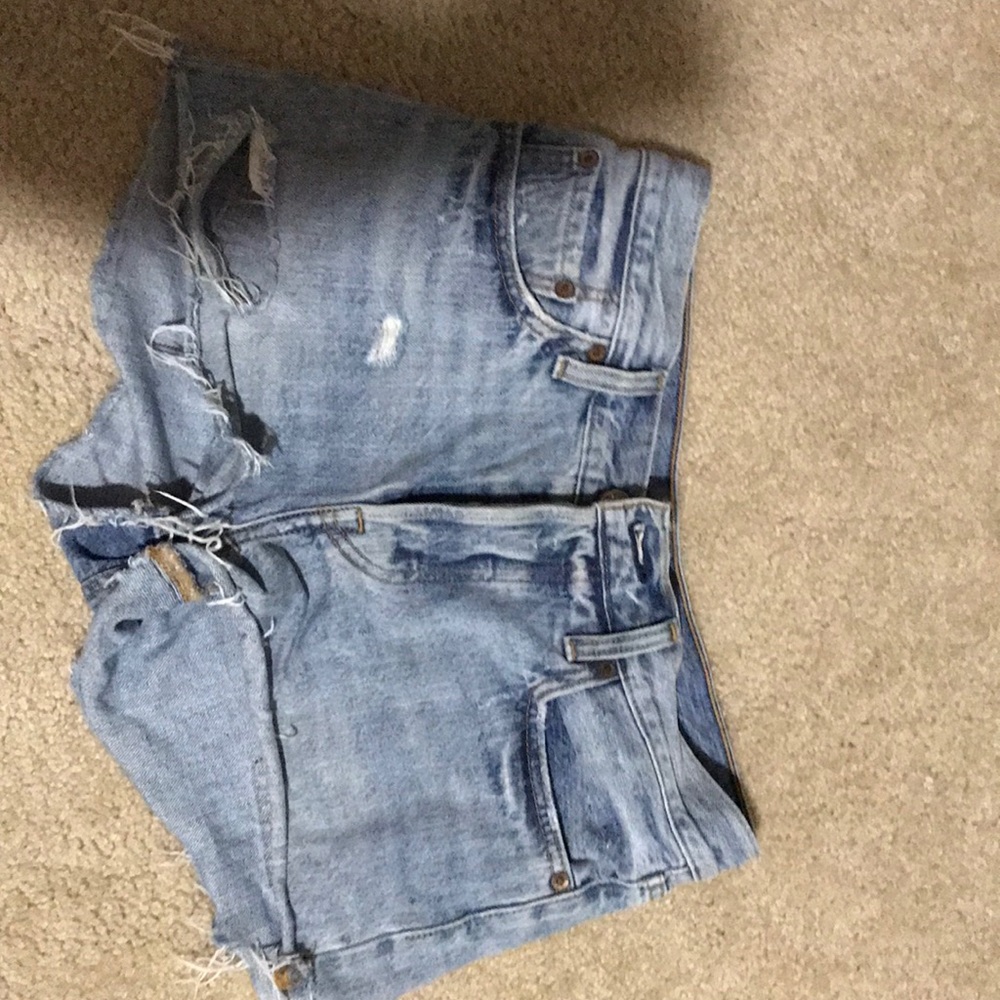 Size 27. Distressed Levi denim shorts